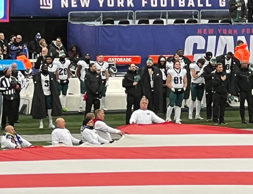 Ed Odell at Giant Football Game, center stage.